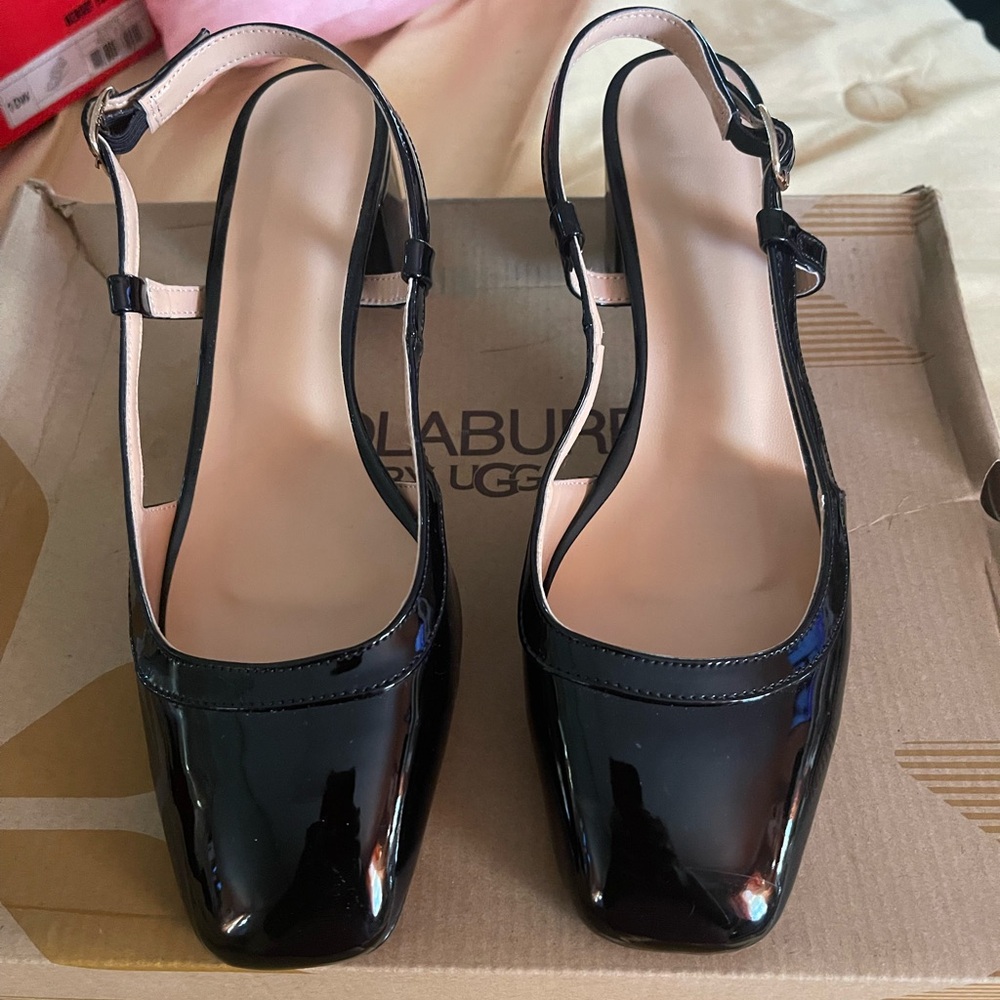 Black patient leather sling back shoes